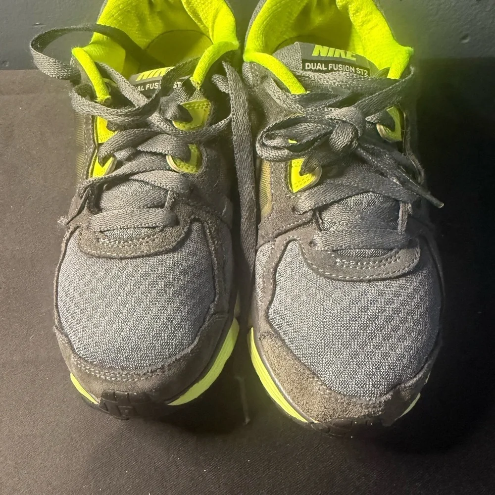 Nike women’s Gray and Neon Green Dual Fusion Sneakers